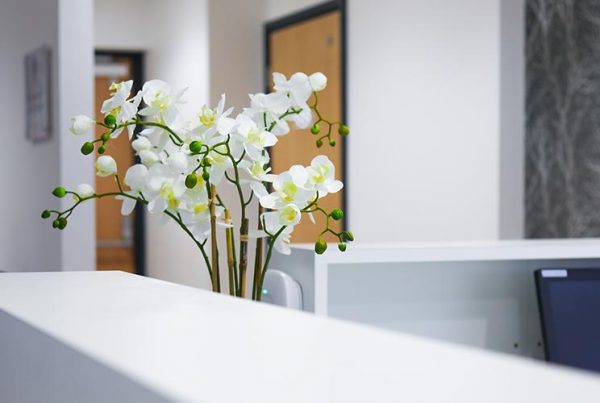picture of white flowers on reception desk