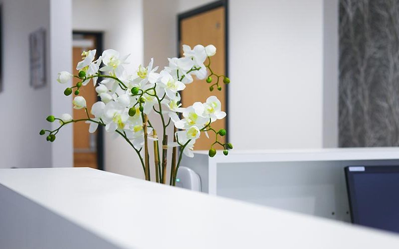 picture of white flowers on reception desk