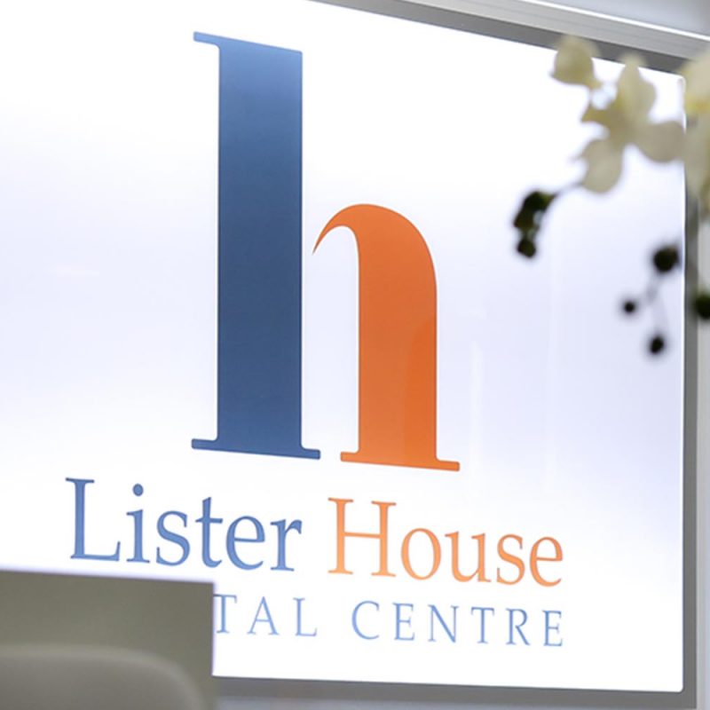 lister house dental logo in illuminated behind reception desk